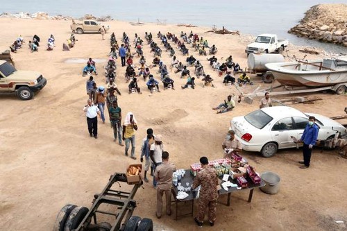 EU anti-migrant smuggler operation 'needs Libya access' - ảnh 1
